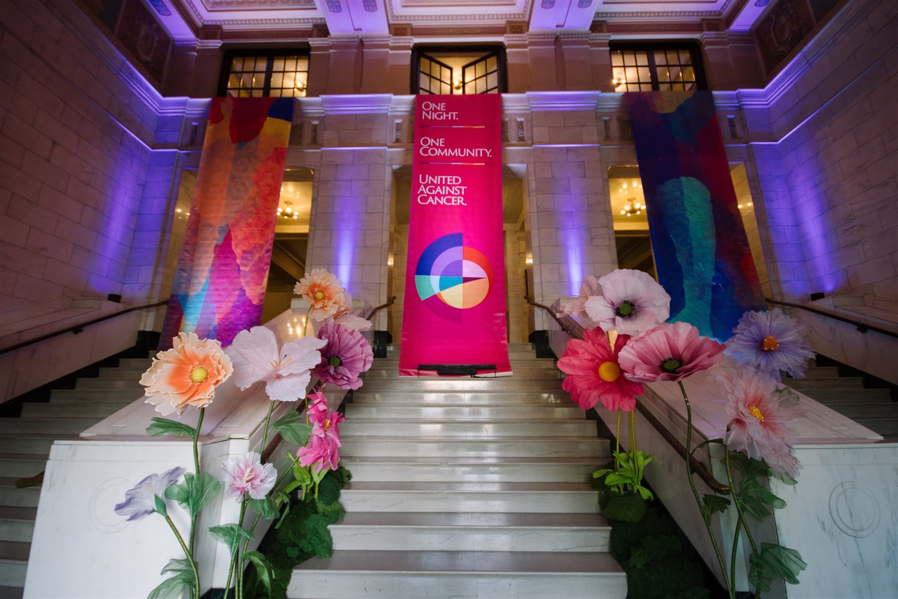 Gala of Hope printed banners displayed above the venue staircase