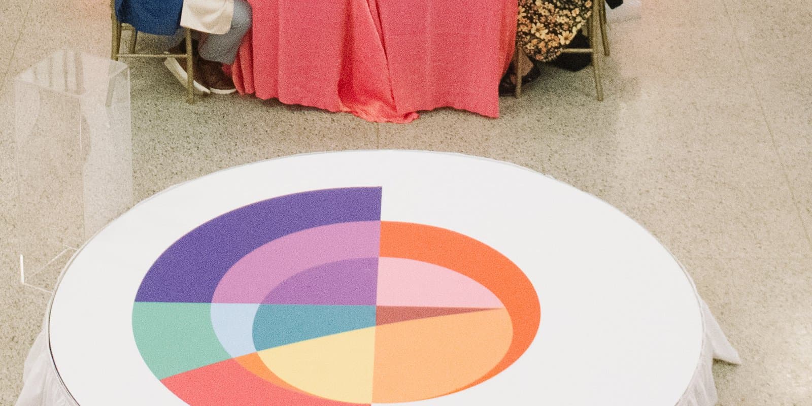 Colorful Gala of Hope logo printed on the round stage floor decal