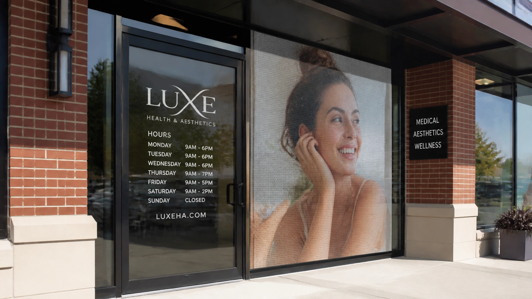 Storefront windows with custom vinyl graphics and privacy film
